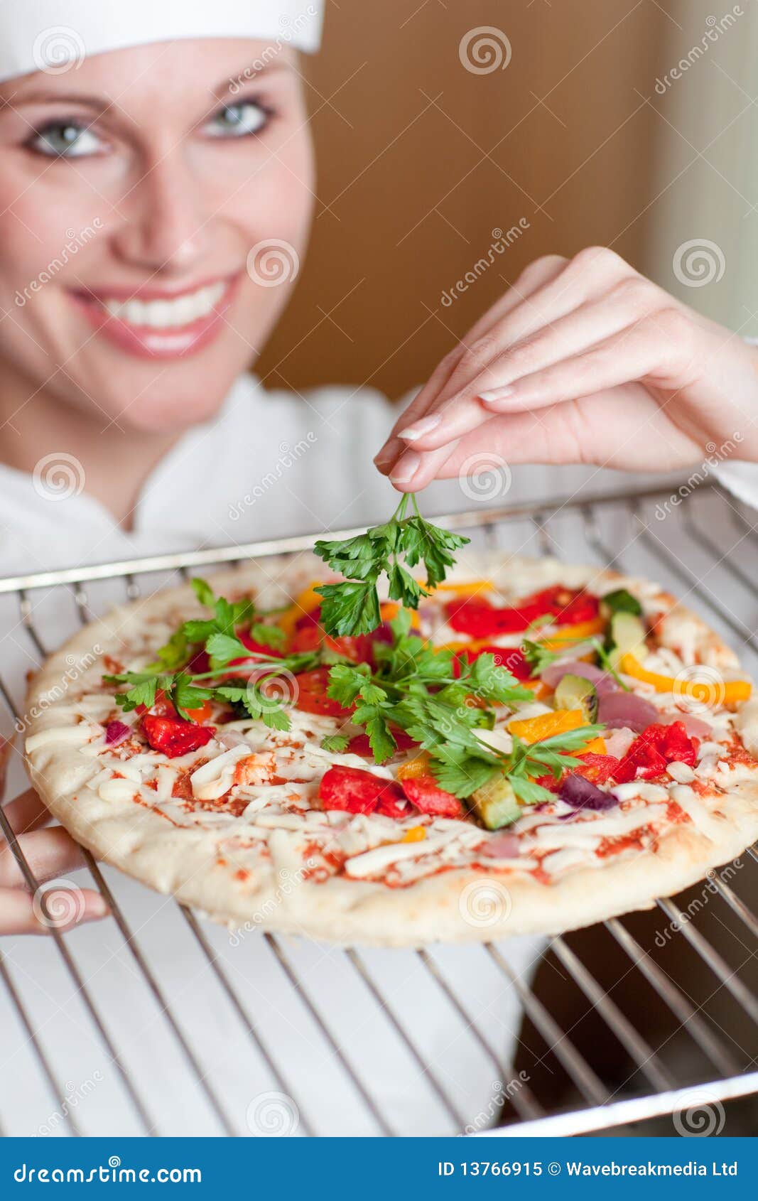 Female Cook Adding Parsley on a Pizza Stock Image Image of smile