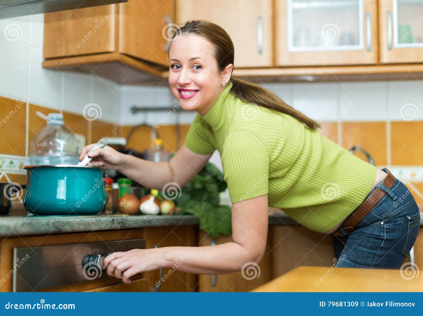 Female Cooking Dinner at Home Stock Image - Image of meat, apartment