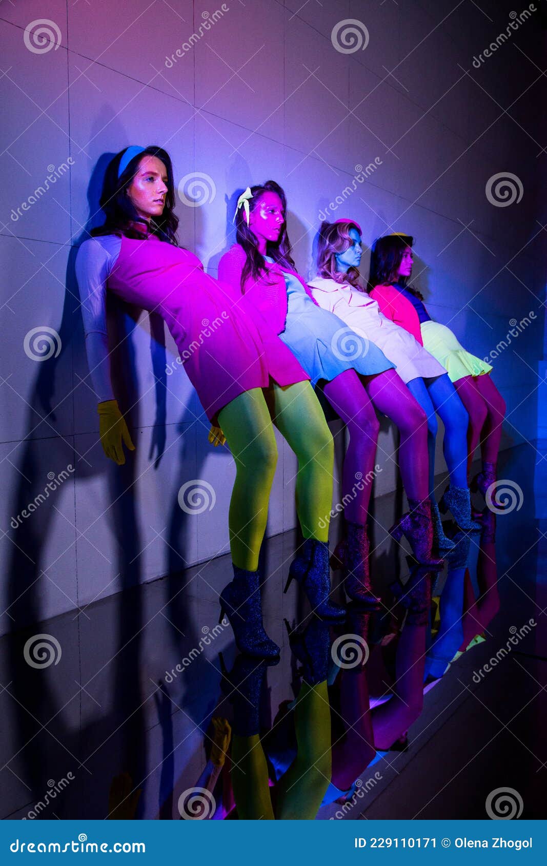 Female Dance Group with Colourful Face Art in Bright Clothes Dancing ...