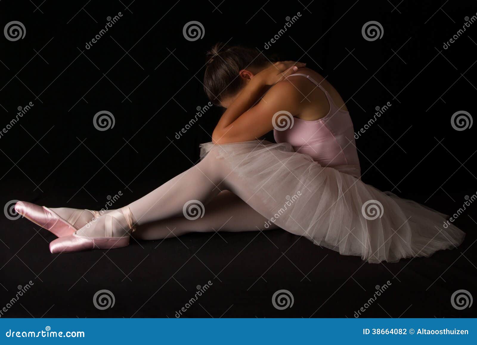 Female Dancer Sit On Floor Looking Sad In Tutu Stock Photo Image