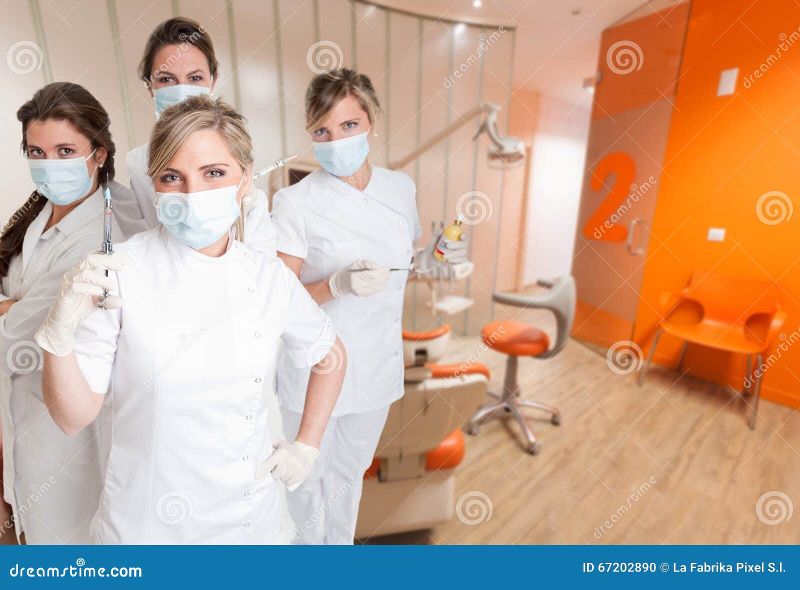 Female dental team stock photo. Image of clinic, professional 67202890