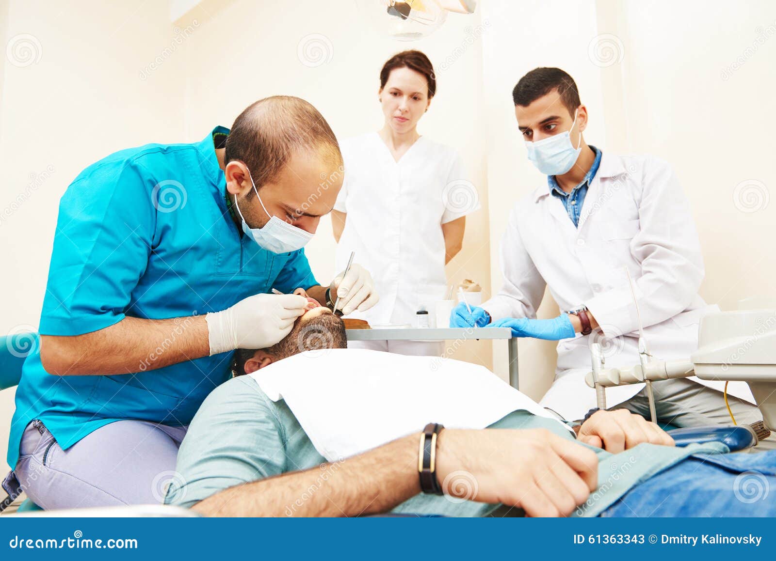 Female Dentist Doctor Teaching Students Stock Image