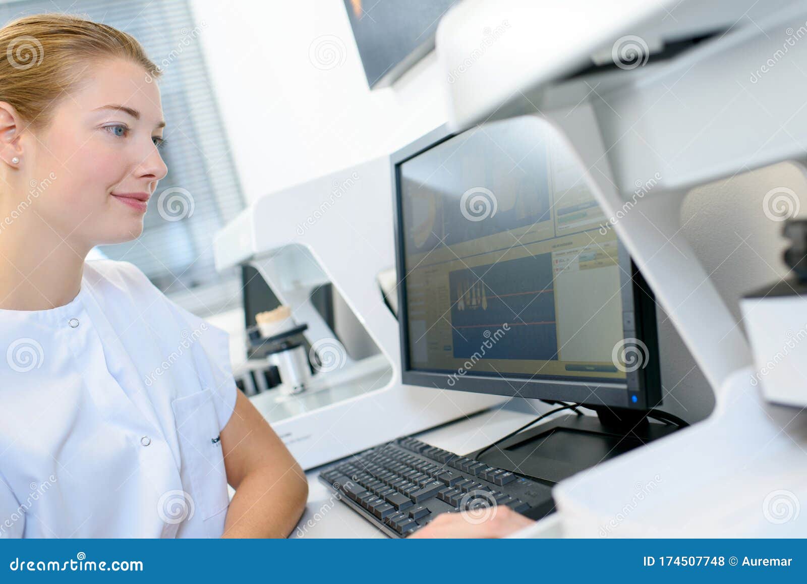 Female dentist using PC stock photo. Image of occupation 174507748