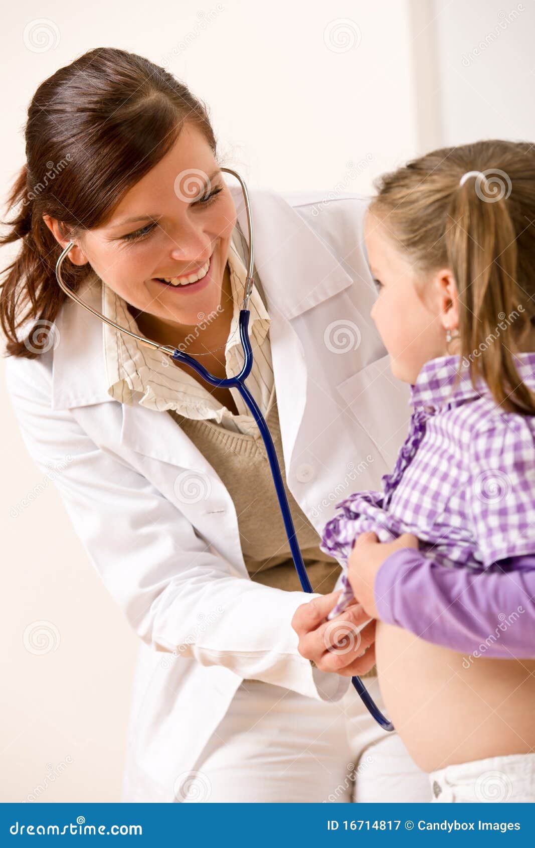 Female Doctor Examining Child with Stethoscope Stock Image Image of