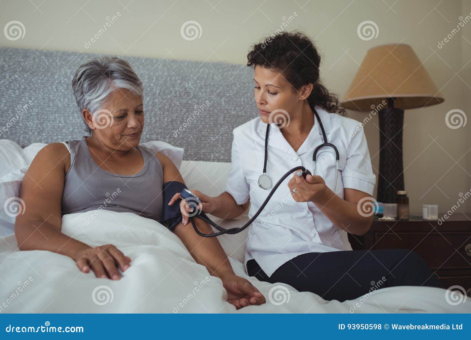 Doctor Measuring Pressure Of The Pregnant Woman. Doctor 