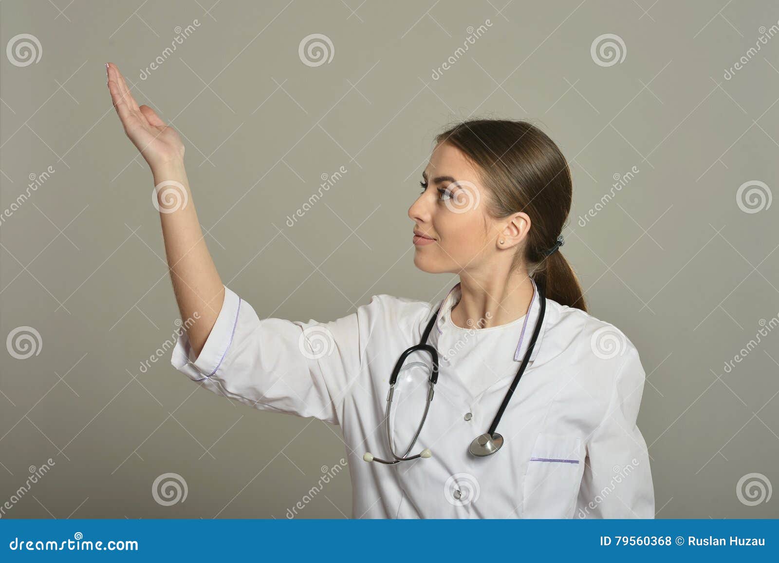 Female doctor shows stock photo. Image of practitioner 79560368