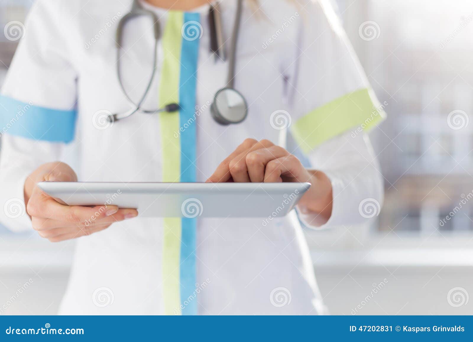 female doctor using ipad at work in hospital