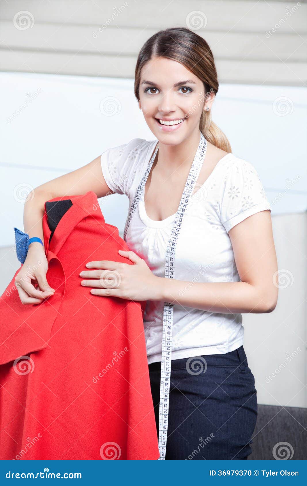 Female Dressmaker Adjusting Clothes Stock Photo Image of expert