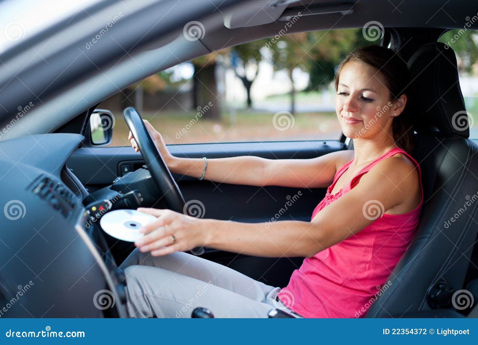 Female Driver Playing Music in the Car Stock Photo - Image of music ...