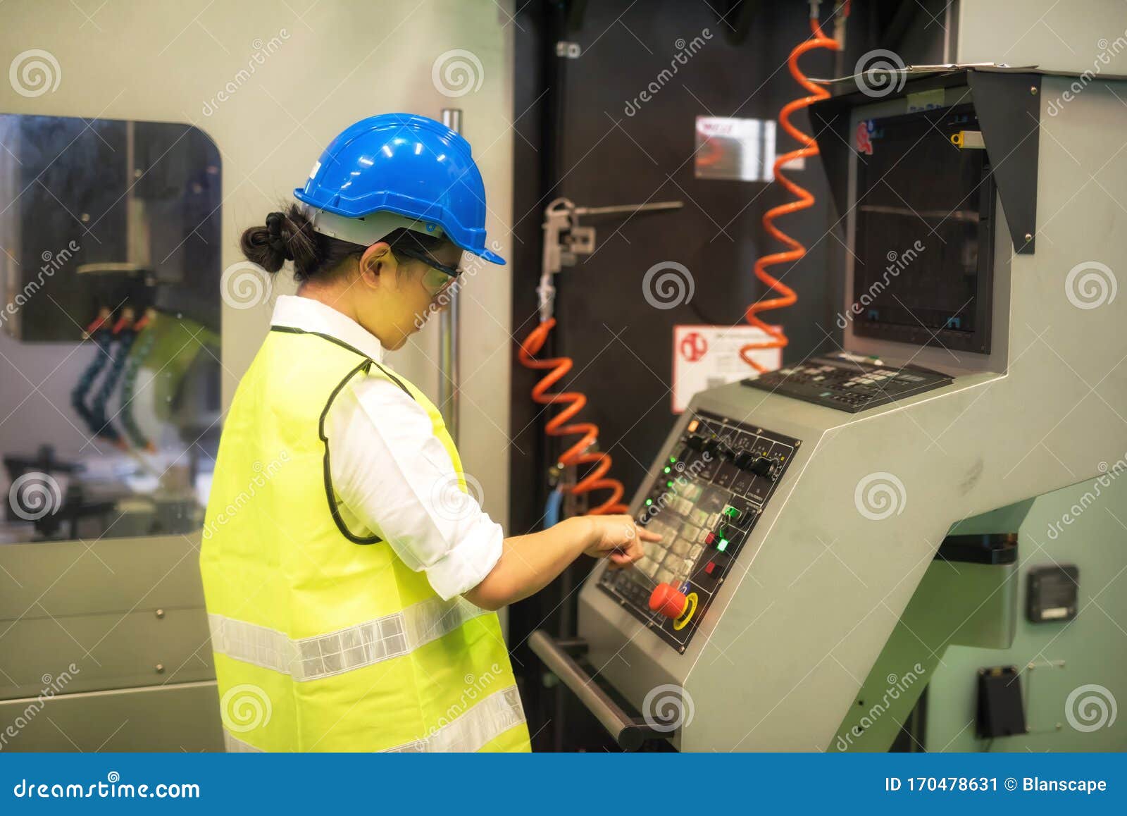 female engineer command factory automate machine