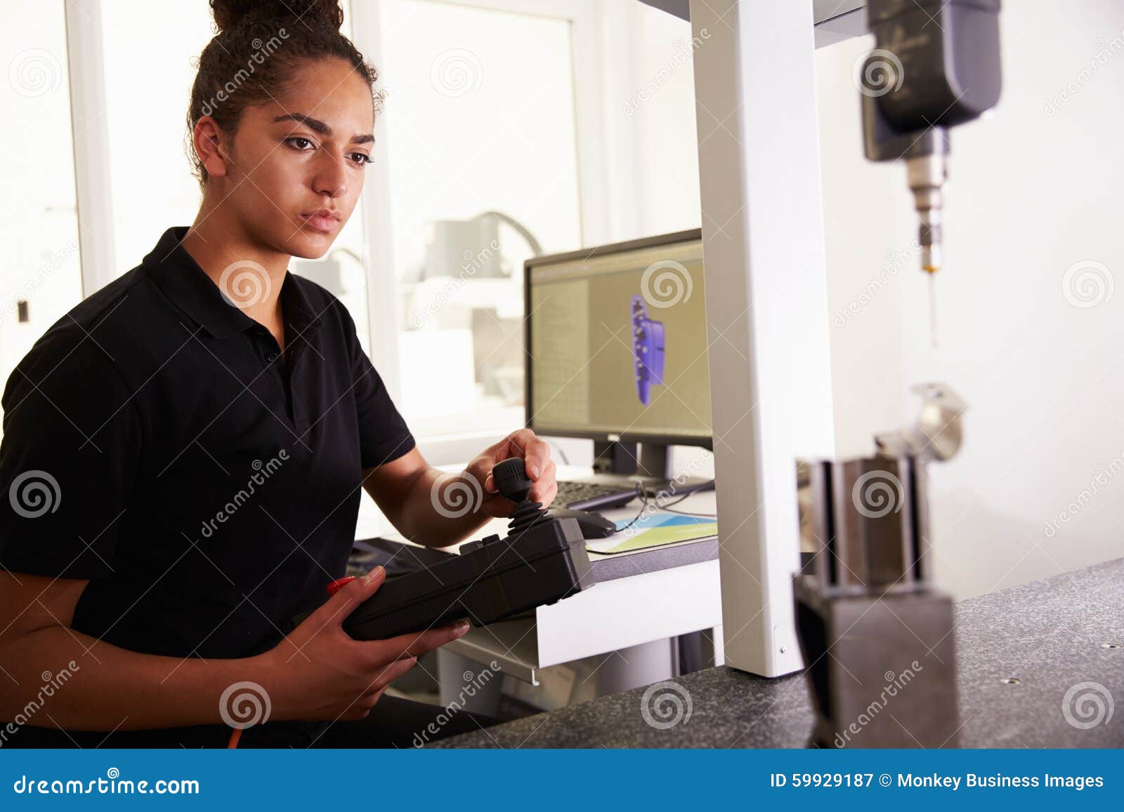 female engineer using cad system to work on component