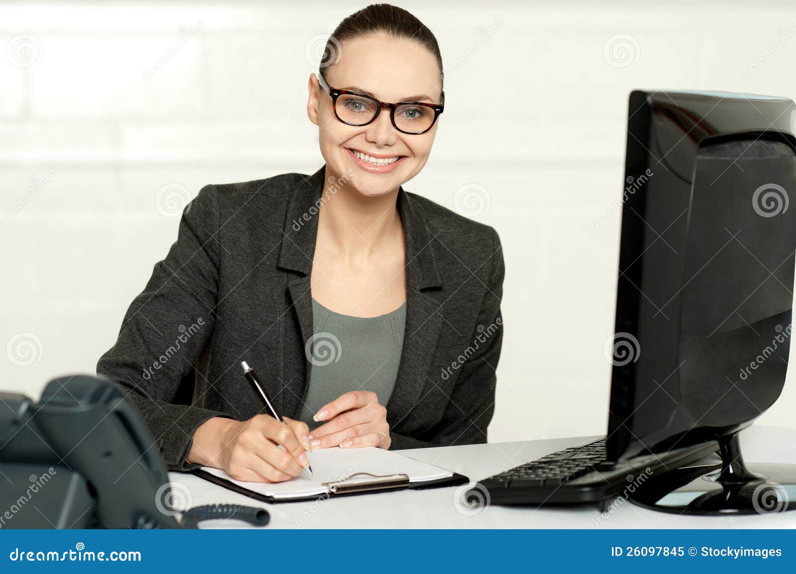Female Executive Writing on Notepad Stock Image Image of desk