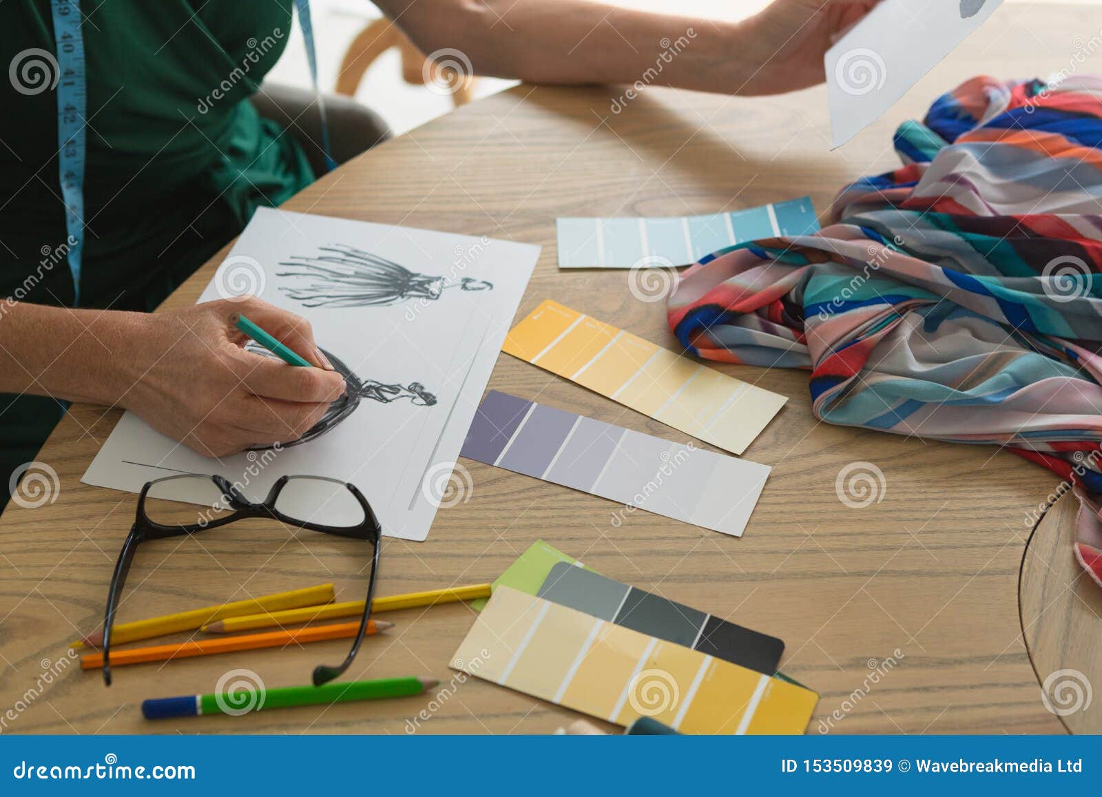 Female Fashion Designer Drawing Sketch on a Table Stock Image - Image ...