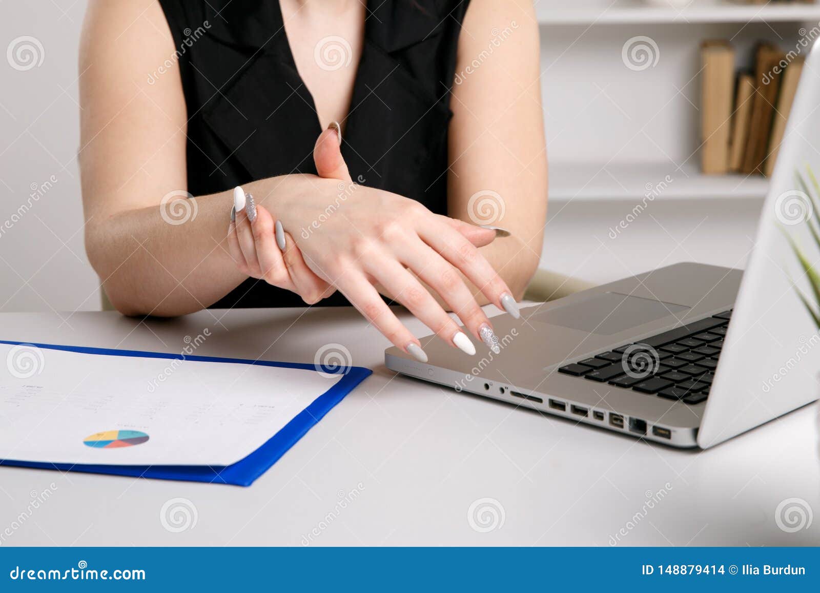 Female Feeling Pain in Wrist after Working on Laptop. Stock Photo Image of pain, computer