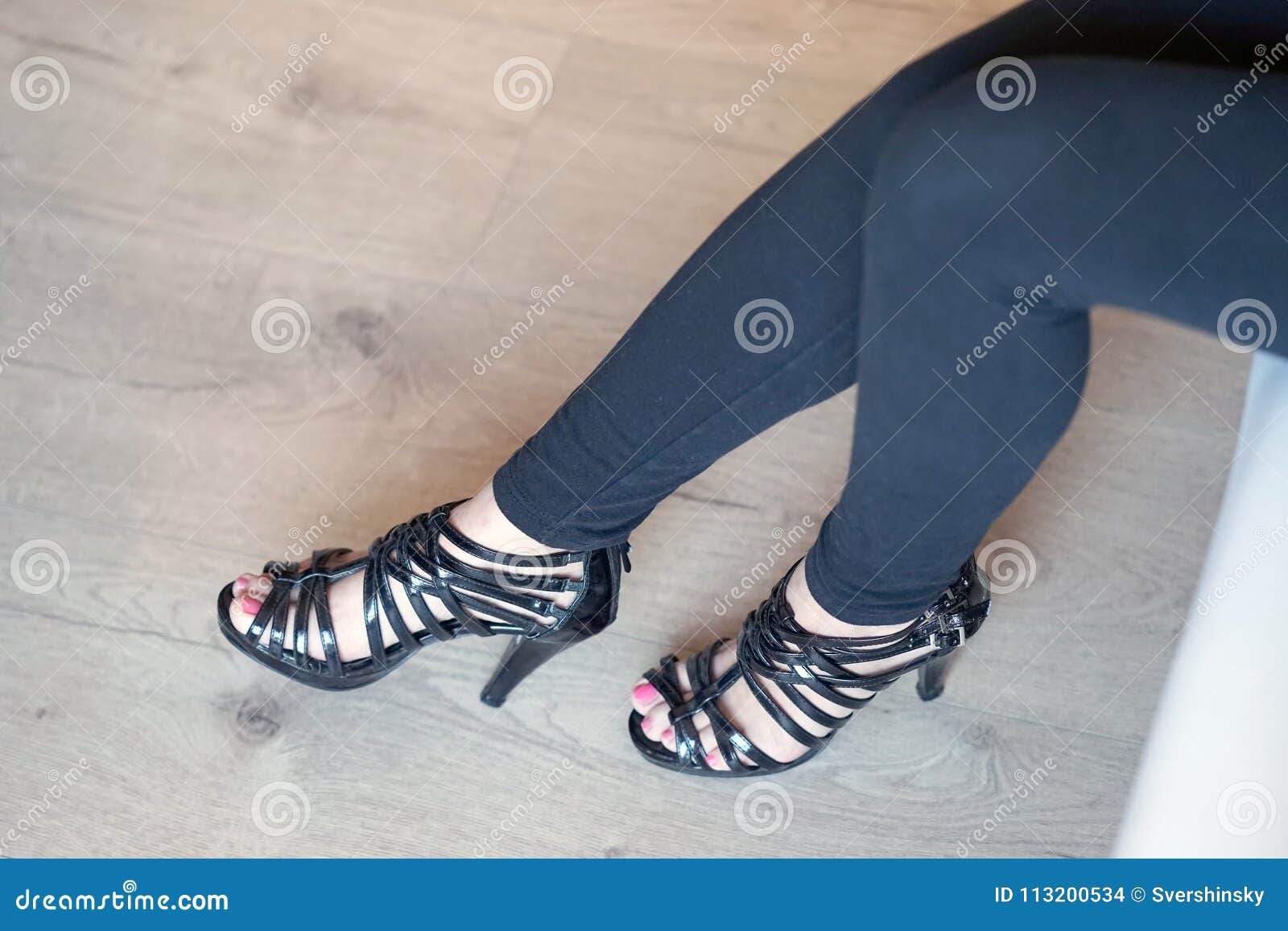 Female feet in black shoes stock photo. Image of lady - 113200534