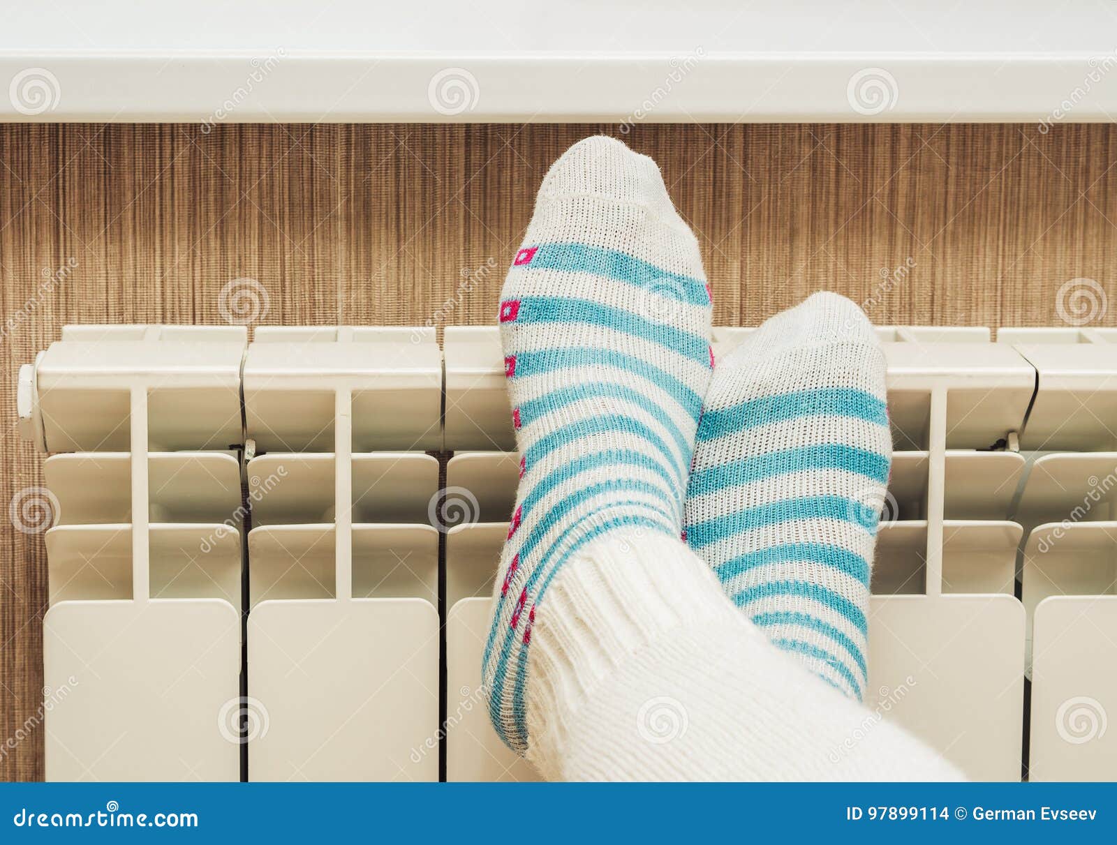 Female Feet on a Central Heating Radiator Stock Photo Image of