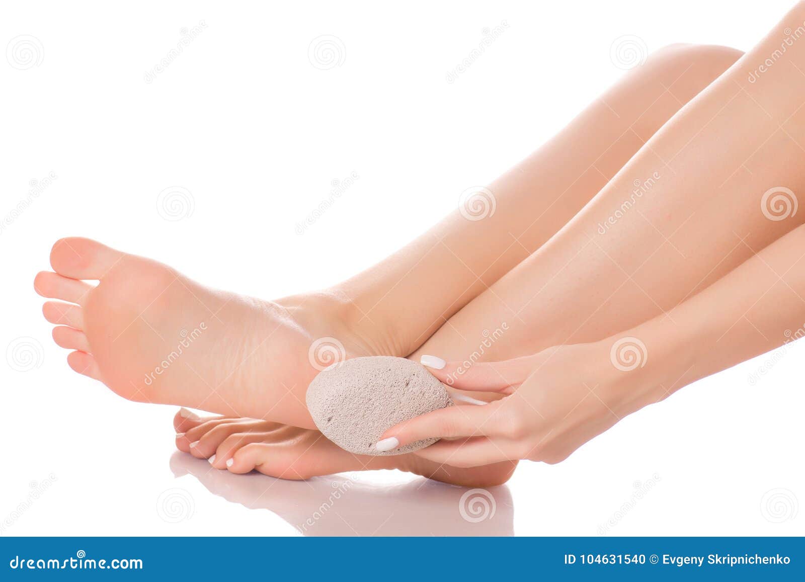 female feet heel stone pumice