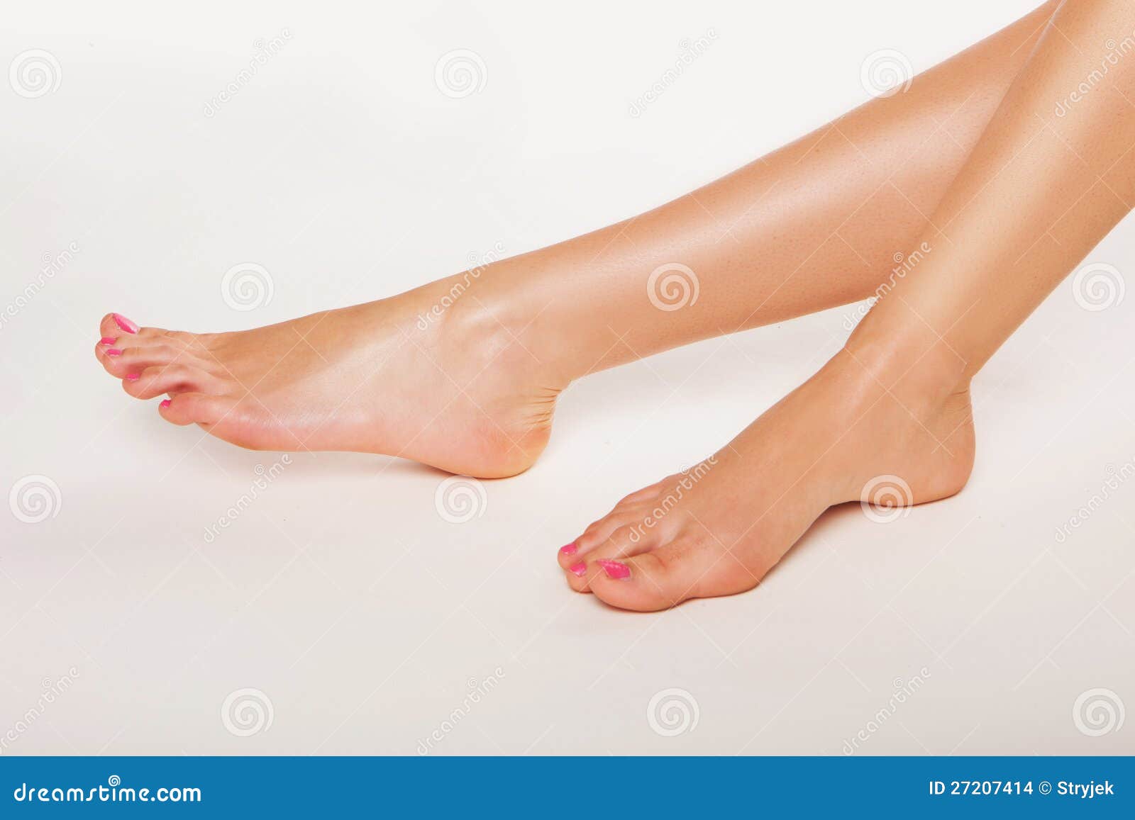 female feet with varnished toenails