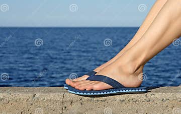 Female Feet Wearing Blue Flip-flops Stock Photo - Image of feet ...