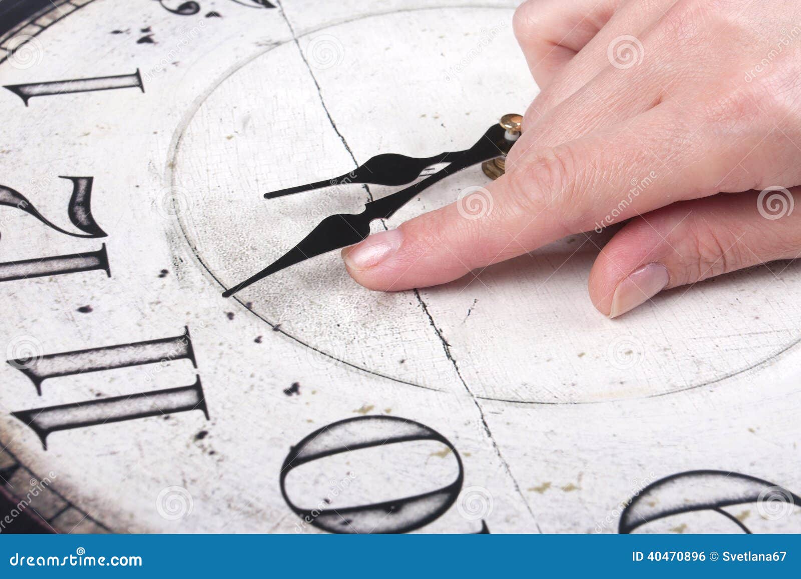 Female Finger Changes The Time On A Clock Stock Photo Image of woman