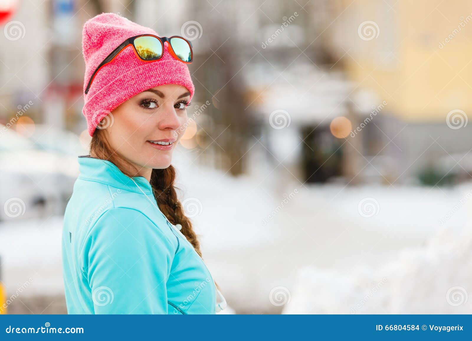 female fitness sport model outdoor in cold winter weather royalty