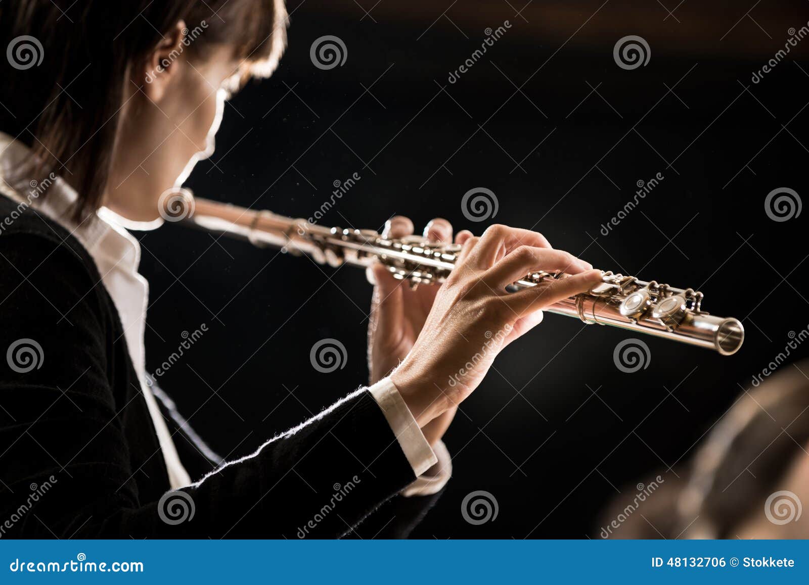Female flutist performing stock photo. Image of woman 48132706