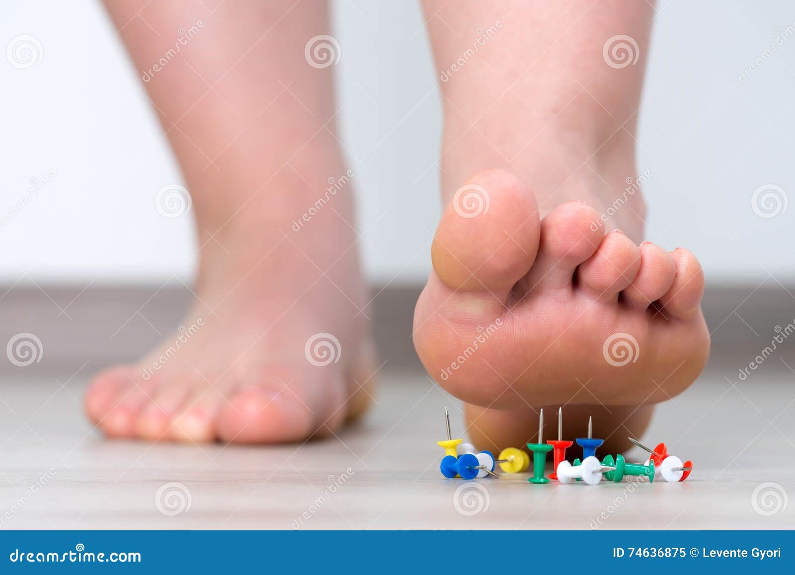 Female Foot Above Colored Pushpin Stock Image - Image of closeup, foot ...