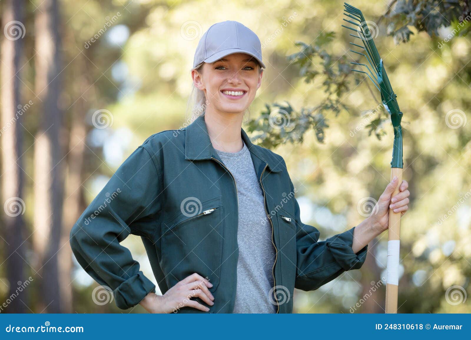 Female Gardener Holding Rake Stock Photo Image of gardener