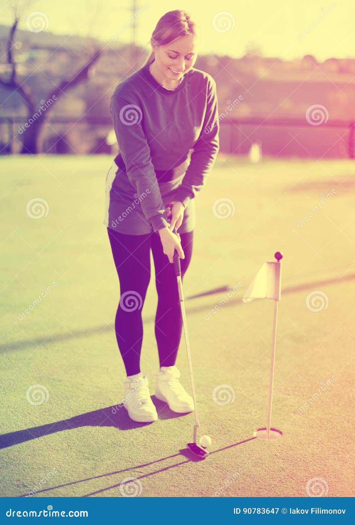 Female Golf Player Getting Ready To Hit Ball Stock Image Image of