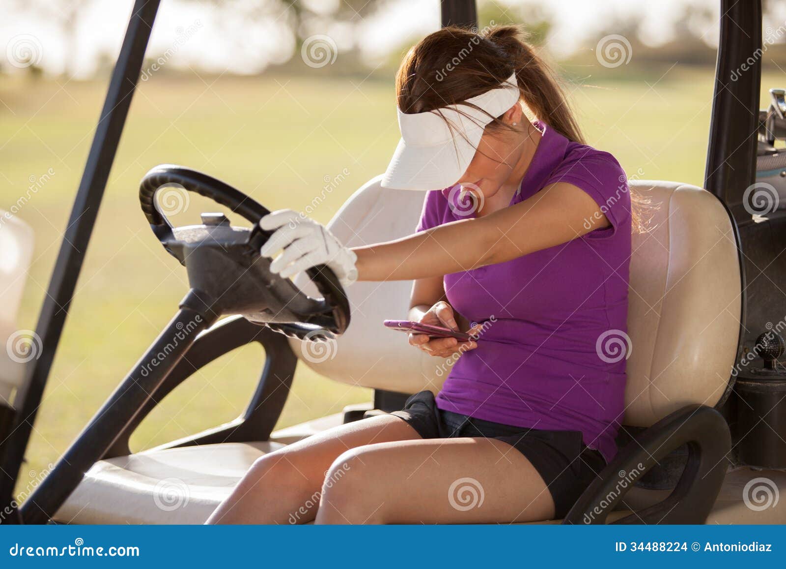 Female Golfer with a Cell Phone Stock Photo Image of golfing, club