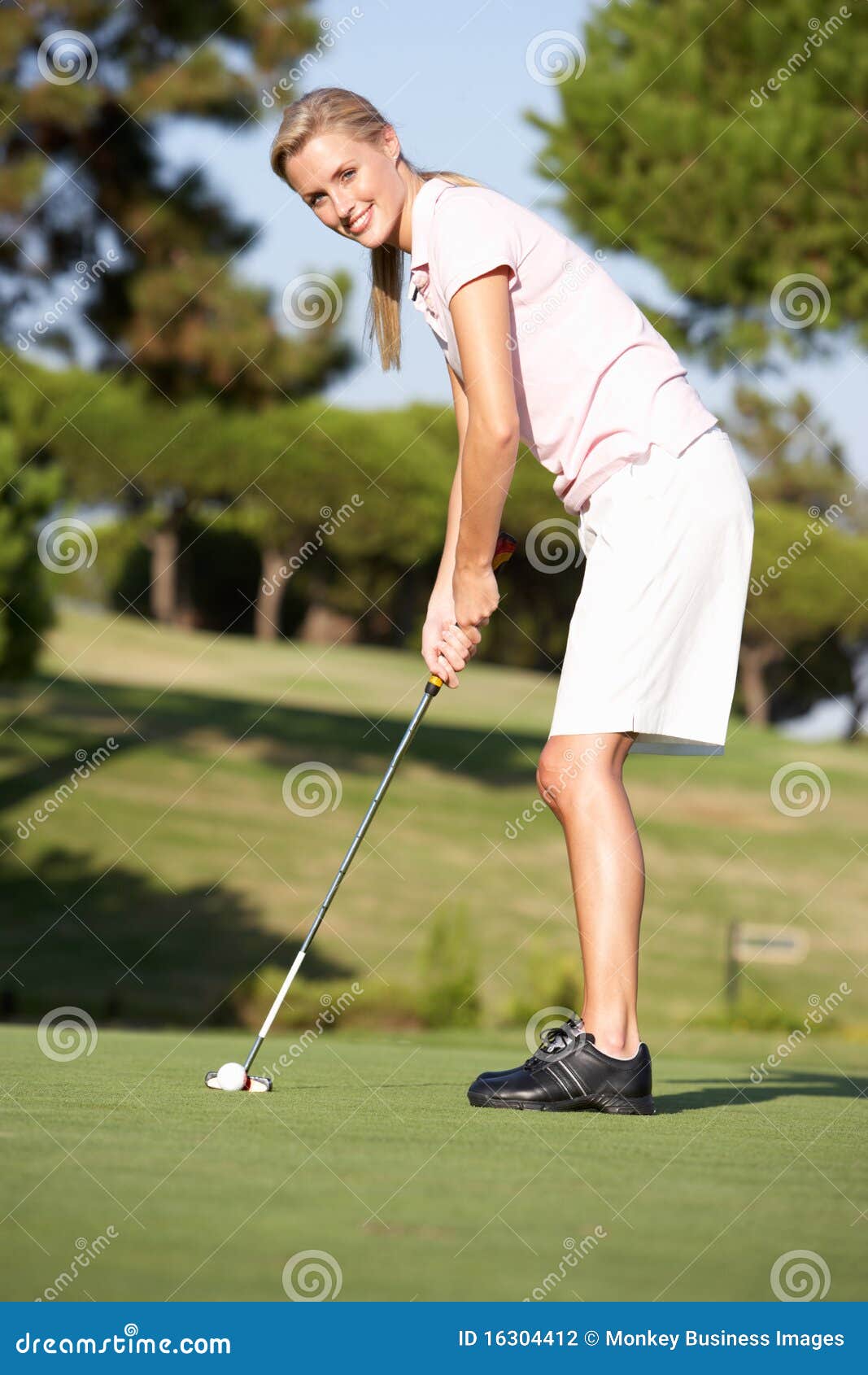 Female Golfer on Golf Course Stock Photo Image of short, putt 16304412