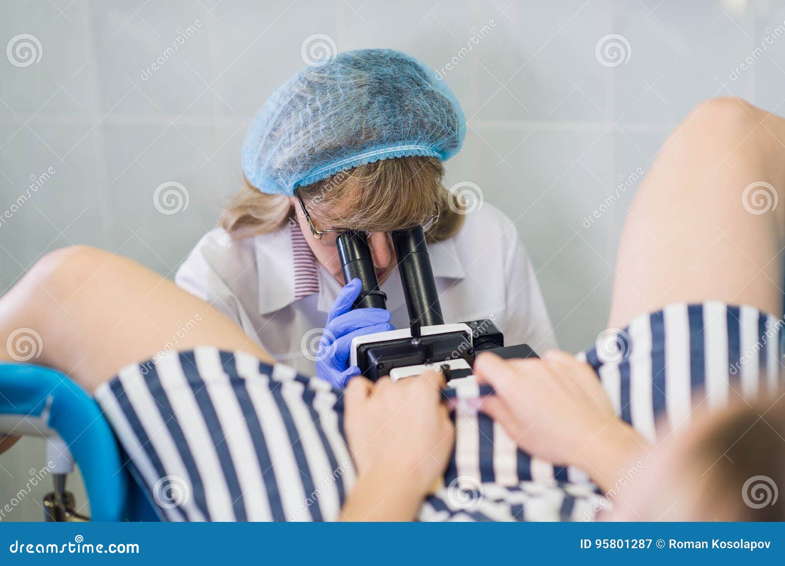 Female Gynecologist During Examination In Her Office Stock I