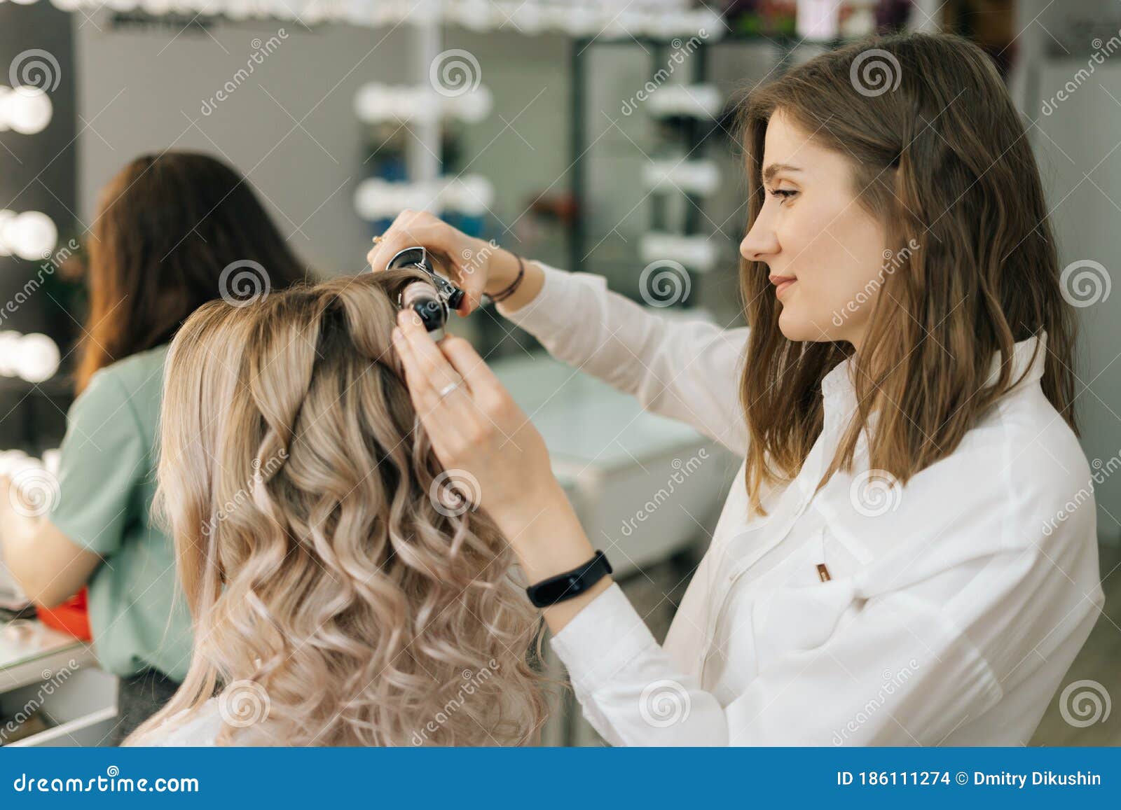 Female Hairdresser Making Hairstyle for Unrecognizable Woman with Blonde  Hair in Salon. Stock Photo - Image of closeup, glamour: 186111274