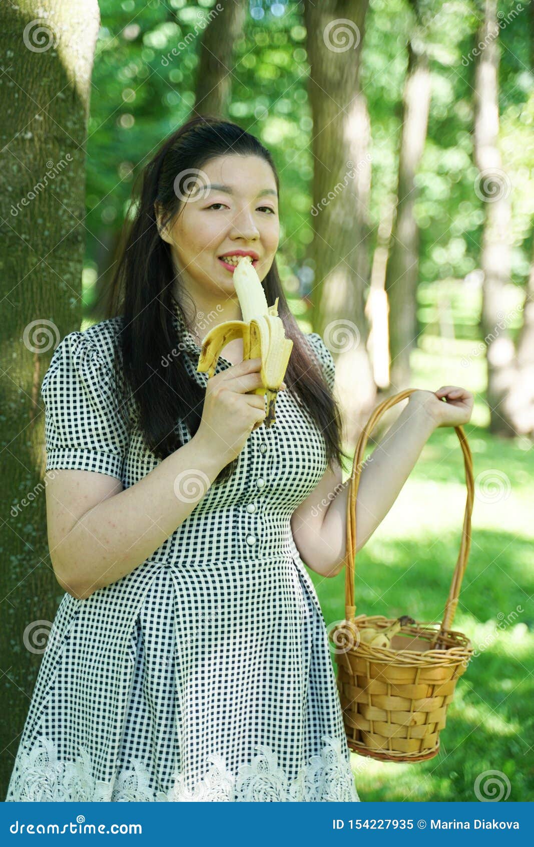 Pretty Plus Size Asian Girl Eating Banana In The City Summer Park Alone Stock Image Image Of 