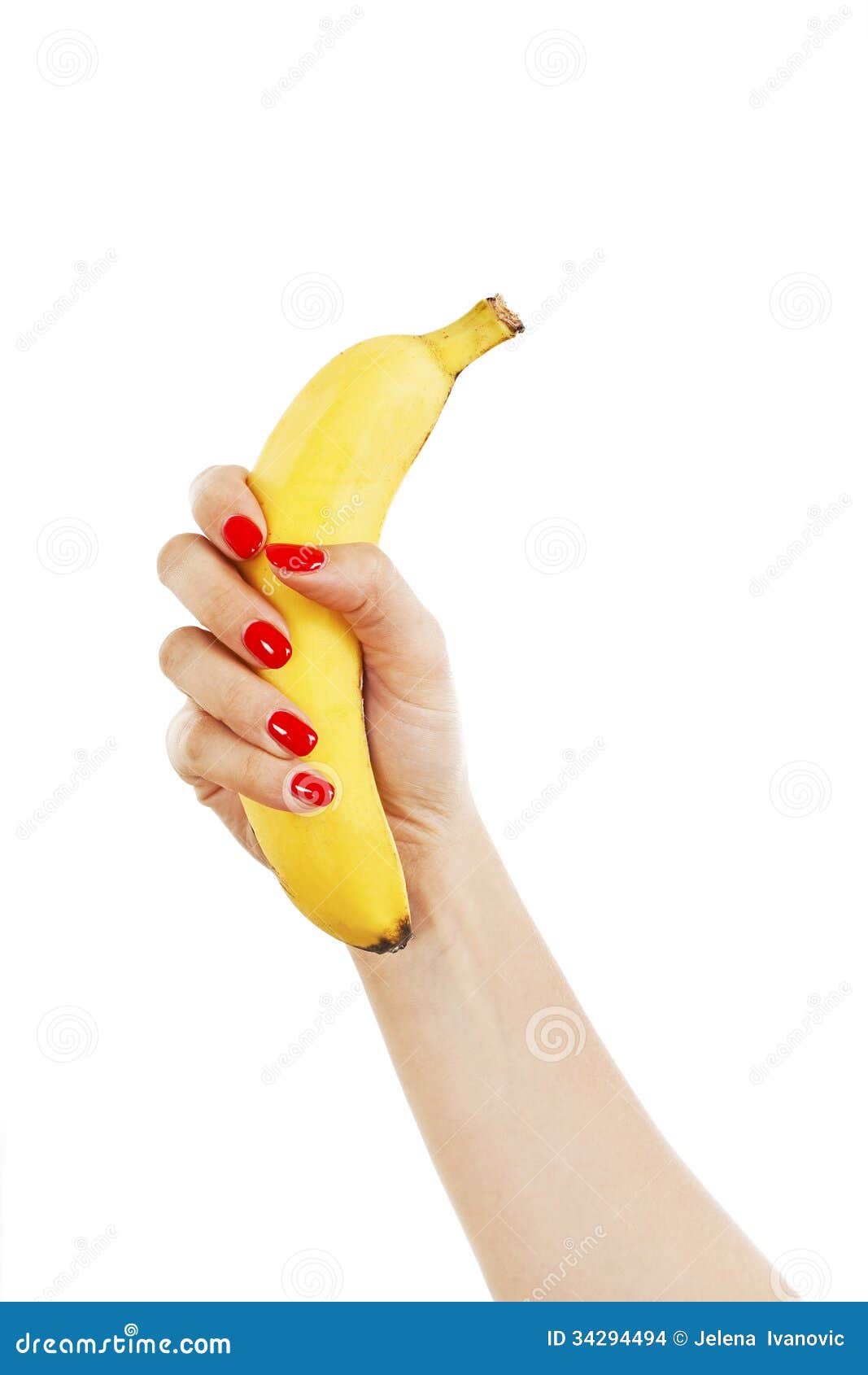 Female Hand with Red Nails Holding a Banana Stock Photo - Image of ...
