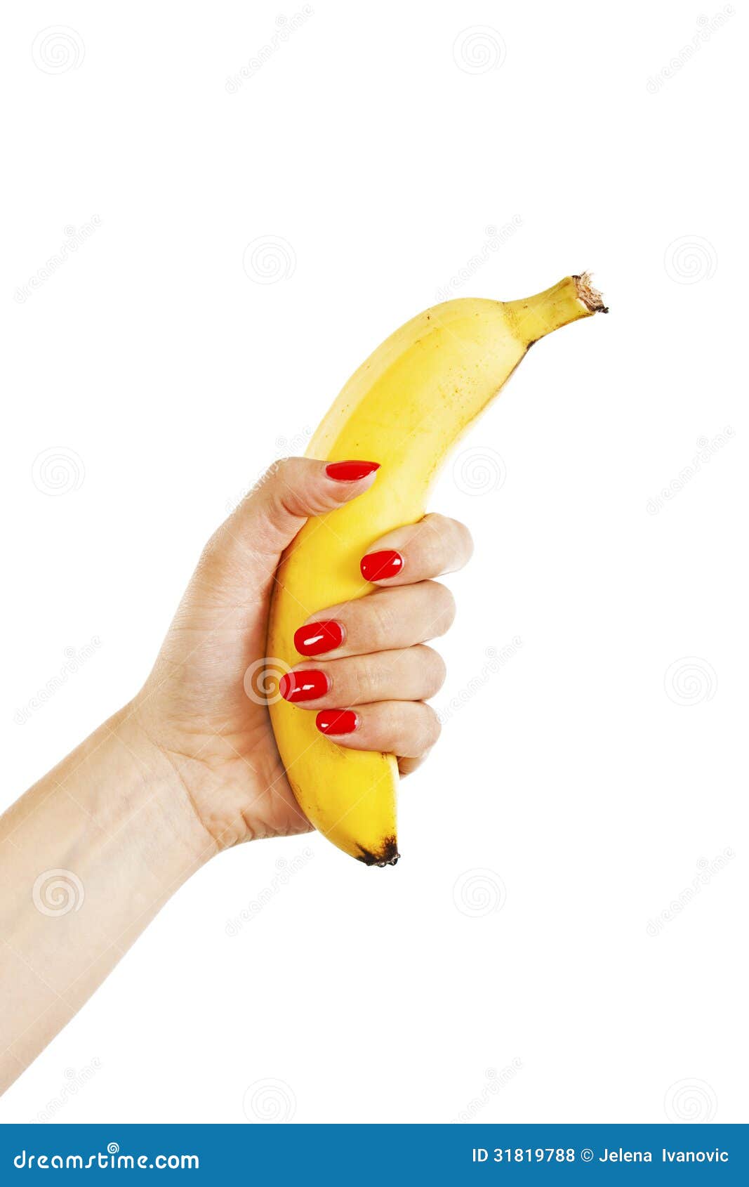 Female Hand with Red Nails Holding a Banana Stock Photo - Image of ...