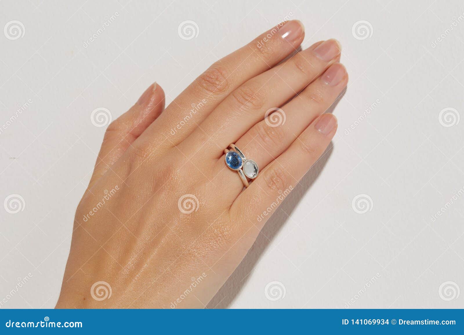 Female hand with a ring. stock photo. Image of female 141069934
