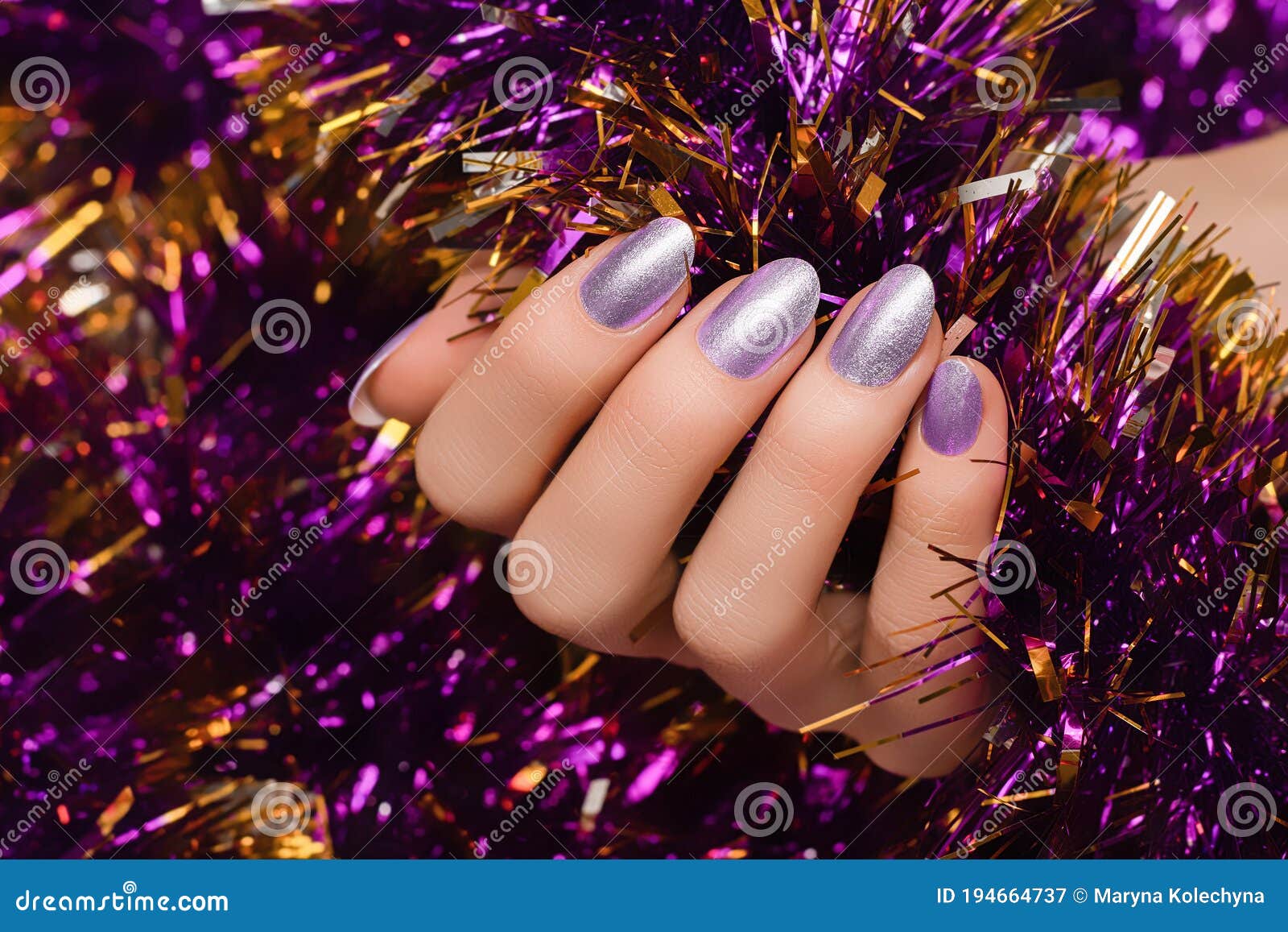 Female Hand with Silver Christmas Nail Design. Silver Nail Polish Manicure.  Female Hand Holding Purple New Year Tinsel Stock Image - Image of gift,  winter: 194664737