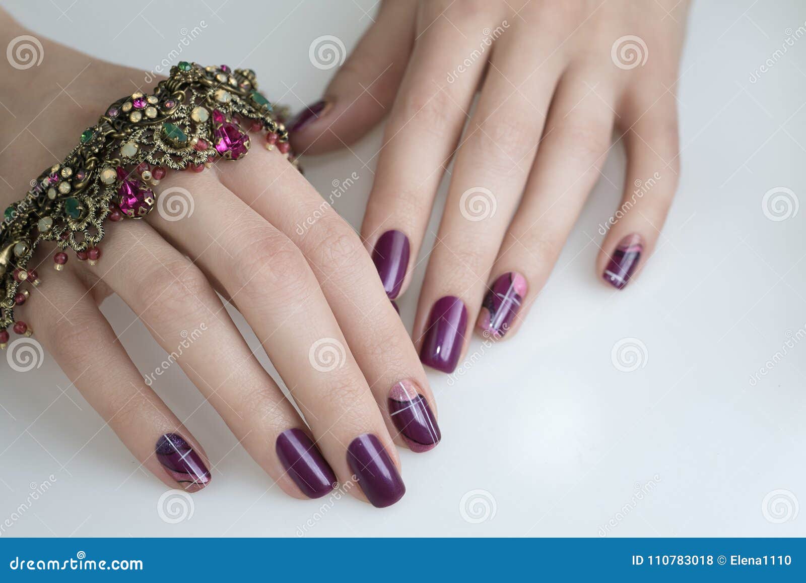manicured woman`s nails with french nail art. nailart manicure.