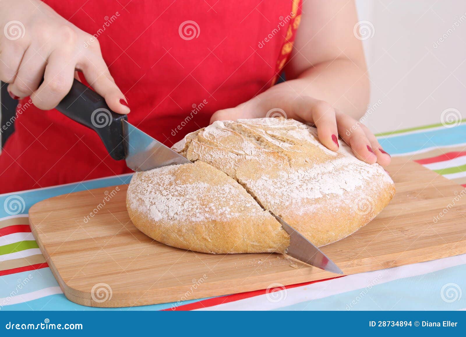 Female hands cutting bread stock photo. Image of nutrition 28734894