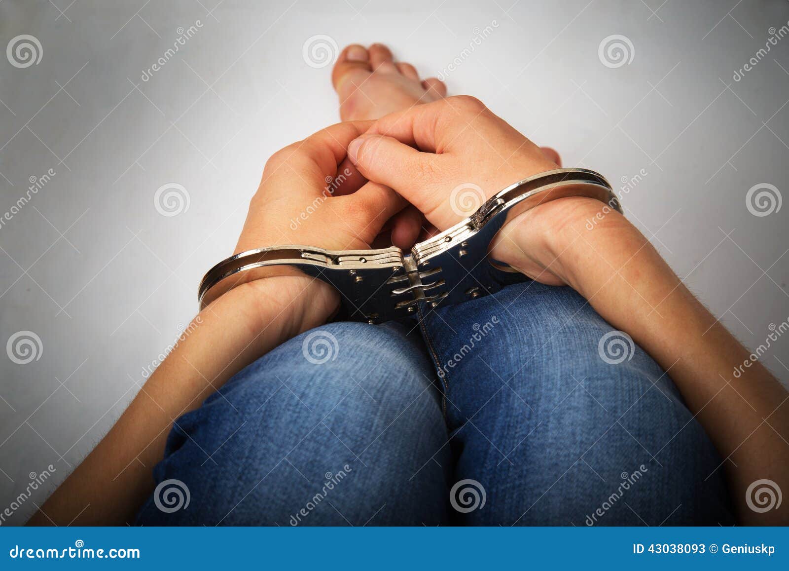 Female hands in handcuffs stock image. Image of human 43038093