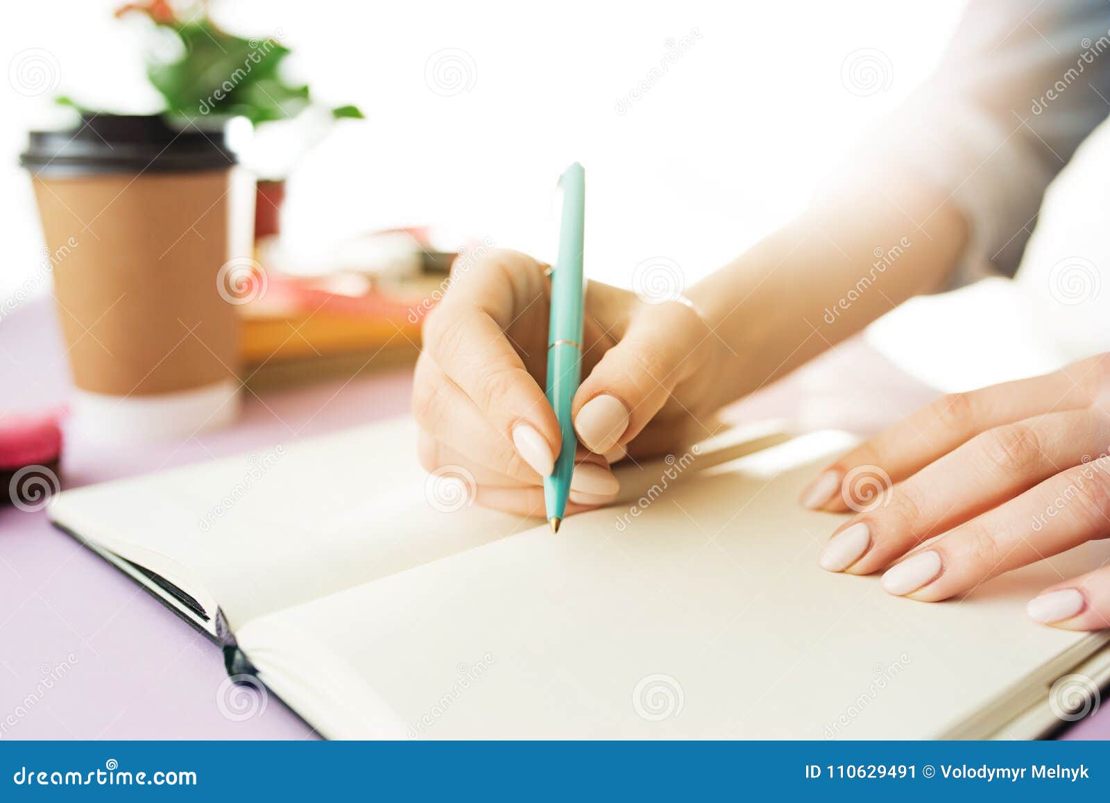 The Female Hands Holding Pen. the Trendy Pink Desk. Stock Image - Image ...