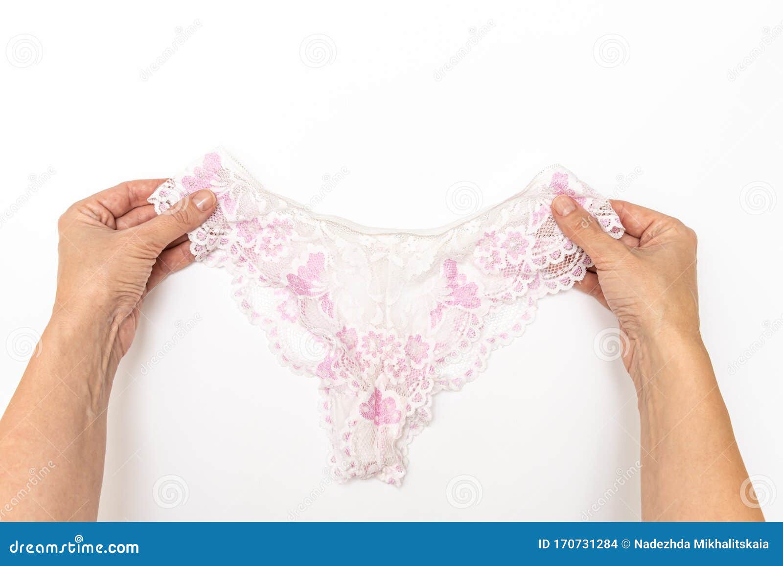 Female Hands Holding White Romantic Lacy Panties, White Background ...