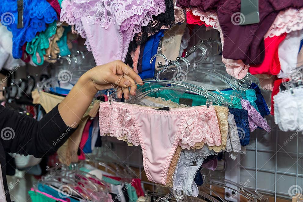 Female Hands With Panties In Underwear Shop Stock Image Image Of