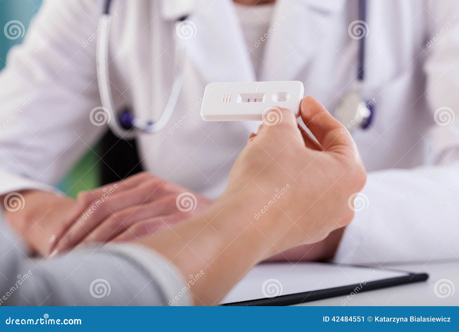 Female Hands with Positive Pregnancy Test at Doctor S Office Stock