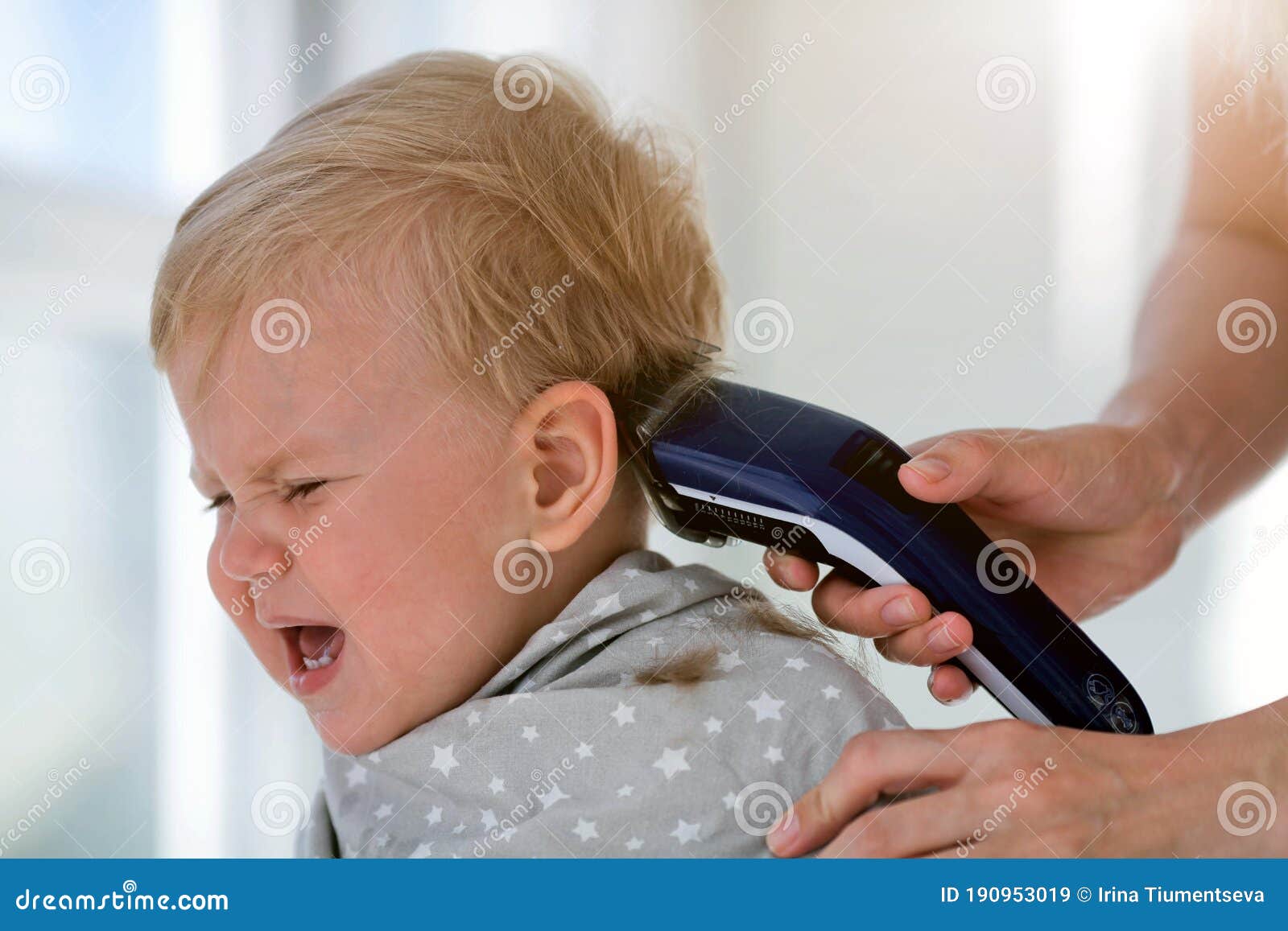 Female Hands Trim a Crying Baby with an Electric Hair Clipper in a Hairdresser. First Haircut Stock Image - Image of hairstyle, head: 190953019 Female Hands Trim a Crying Baby with an Electric Hair Clipper in a Hairdresser. First Haircut Stock Image - Image of hairstyle, head: 190953019