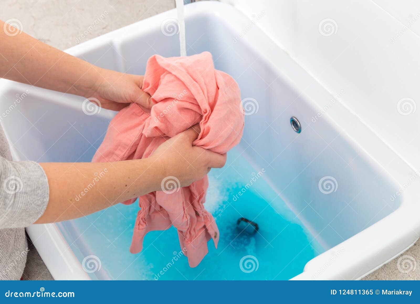 Female Hands Washing Color Clothes In Sink Stock Image