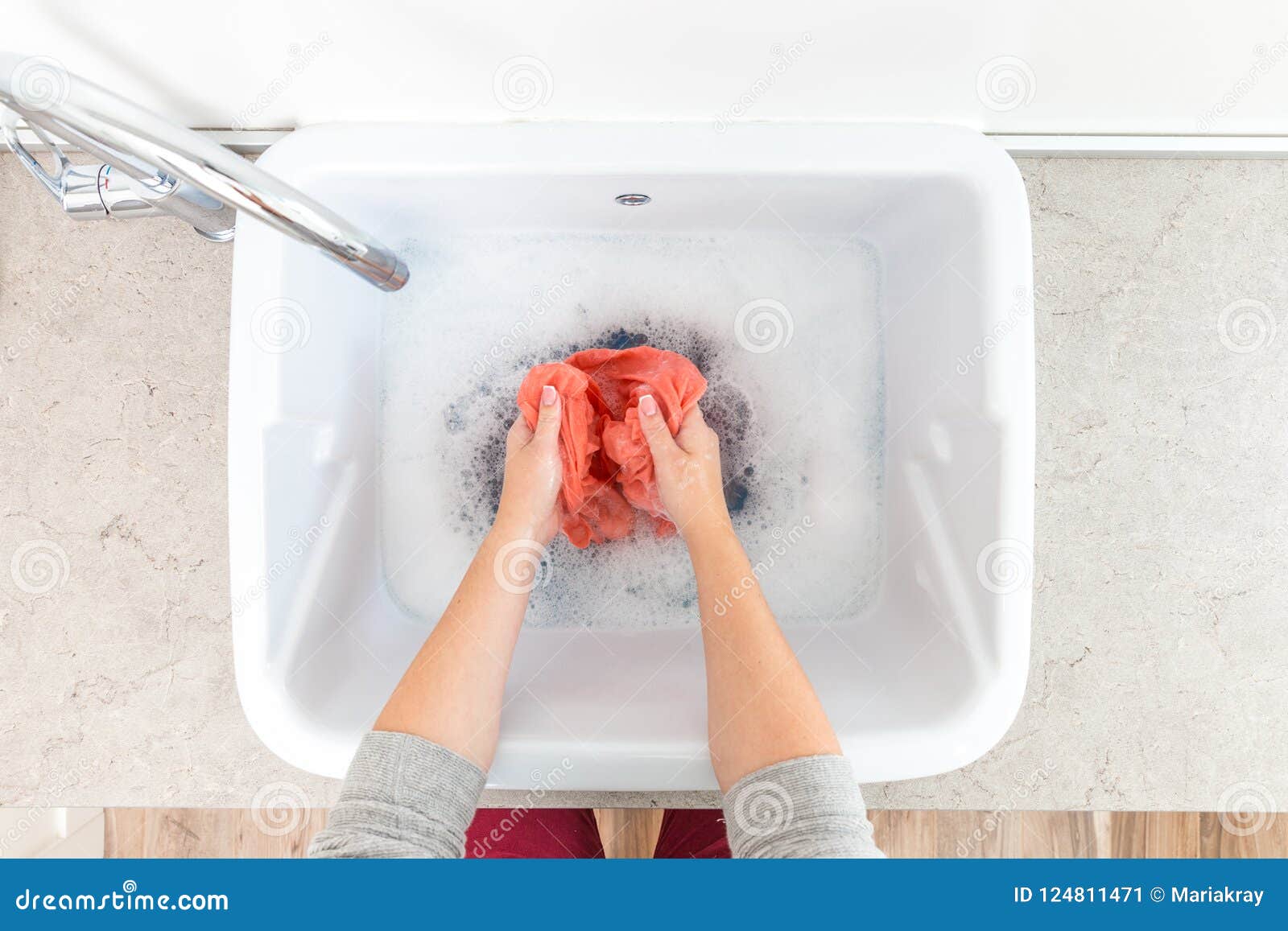 Female Hands Washing Color Clothes In Sink Stock Image
