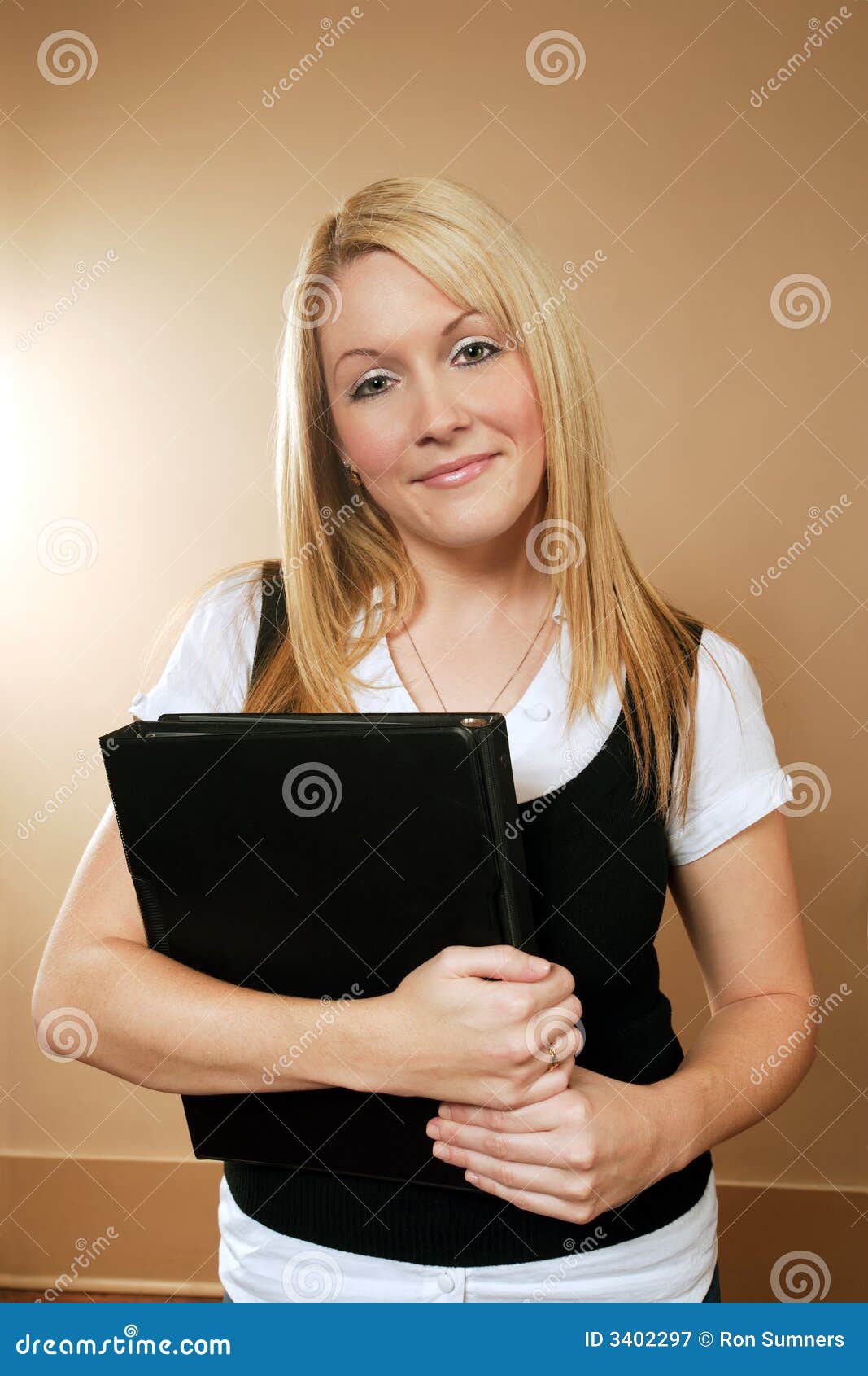 Female holding binders stock image. Image of graduation 3402297