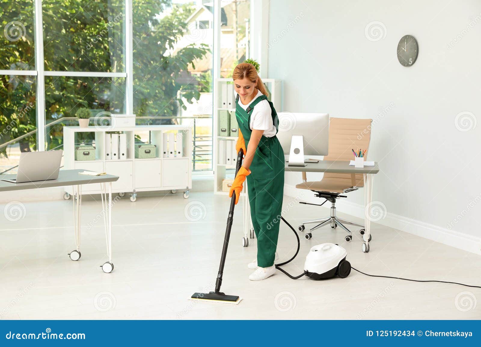 Female Janitor in Uniform Cleaning Floor Stock Photo Image of hoover